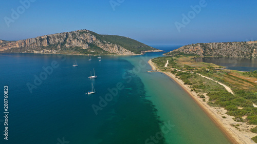 Aerial drone photo of iconic sandy beach of Divari (chrysi akti) with emerald sea near island of Sfaktiria in bay of Navarino, Messinia, Gialova, Peloponnese, Greece © aerial-drone