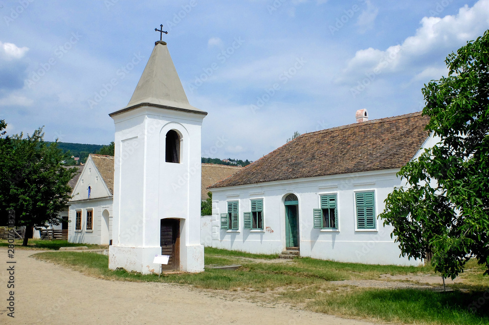 Village street with a church