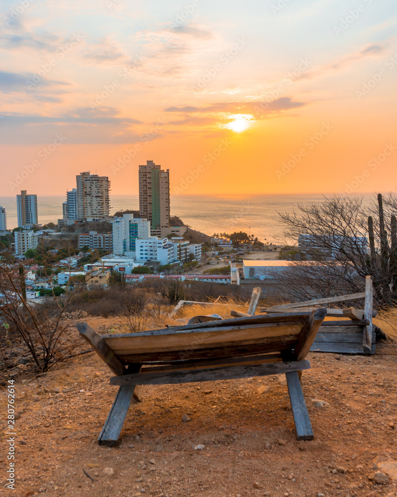 Sunset overlooking the beach and the city of Santa Marta, Colombia Sunset overlooking the beach and the city of Santa Marta, Colombia