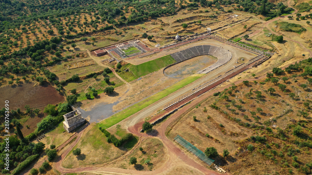 Aerial drone photo of unique and well preserved archaeological site and citadel of Ancient Messene featuring massive stadium and theatre, Messinia, Peloponnese, Greece
