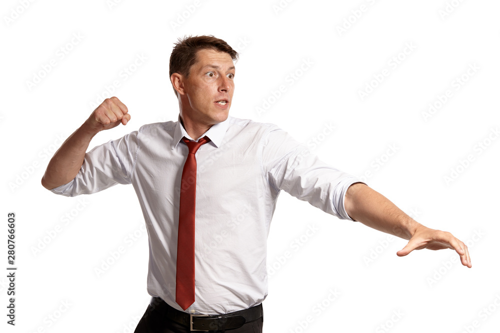 Portrait of a young brunet man posing in a studio isolated over a white background. Portrait of a young brunet man posing in a studio isolated over a white background.
