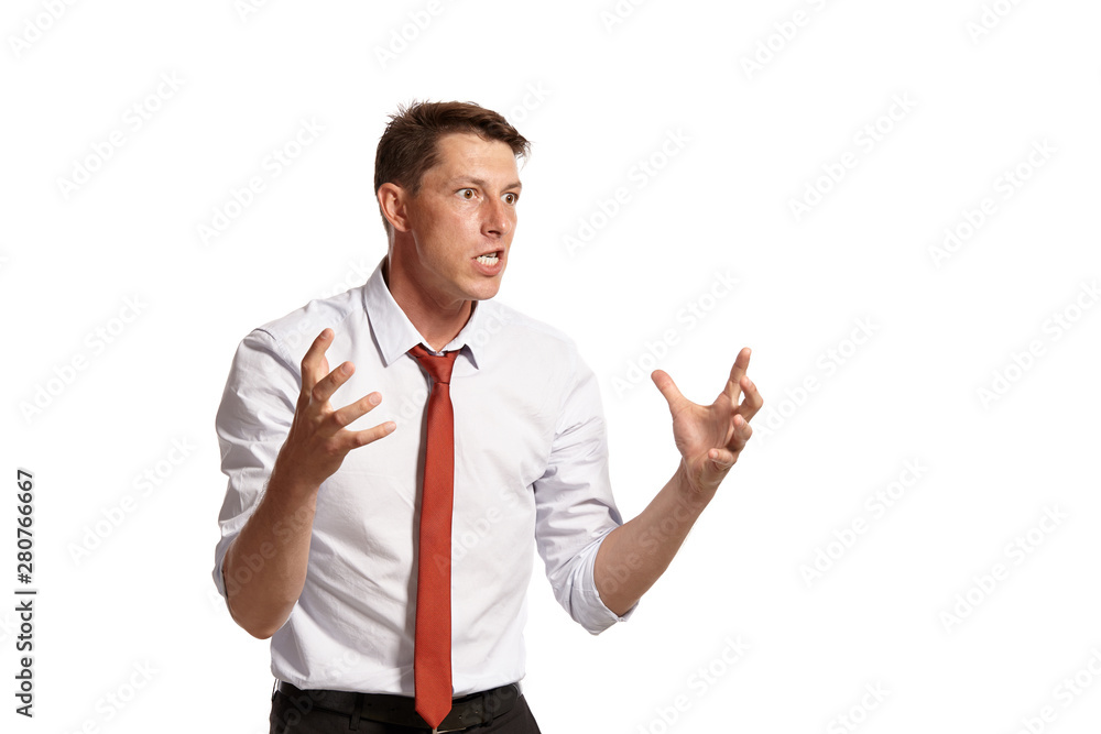 Portrait of a young brunet man posing in a studio isolated over a white background. Portrait of a young brunet man posing in a studio isolated over a white background.