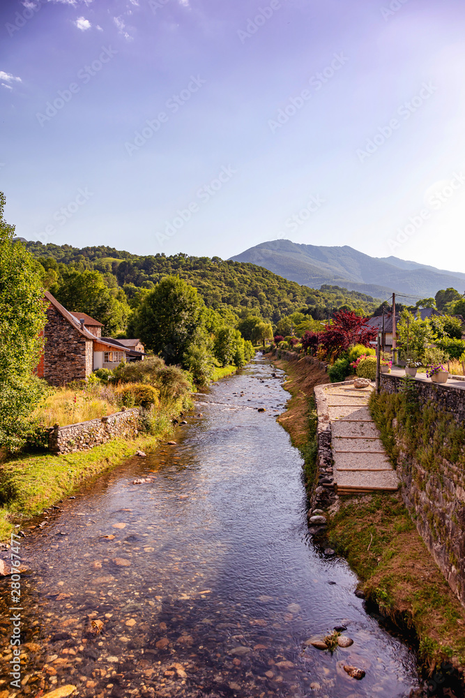 Fototapeta premium View of the river Audressein village in the department of Ariège, in the Pyrenees, Occitanie region, France