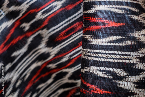 Roll of hand woven T'nalak cloth, made from organic Abaca plant fibers. Plant based textile. Animal free product. Selective focus. Copy space.