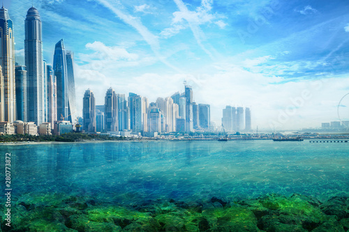 UAE, United Arab Emirates. Dubai and the Persian gulf at sunset. Under the water life illustration