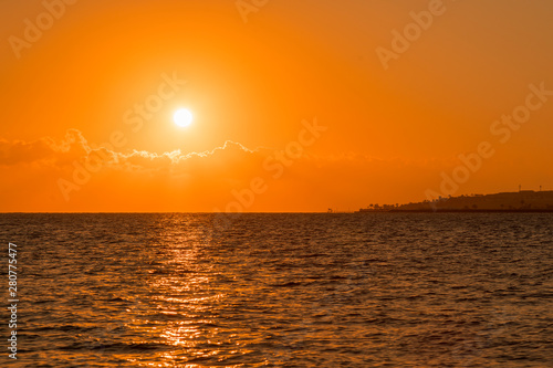 Colorful dawn over the sea  Sunset. Beautiful magic sunset over the sea. Beautiful sunset over the ocean. Sunset over water surface