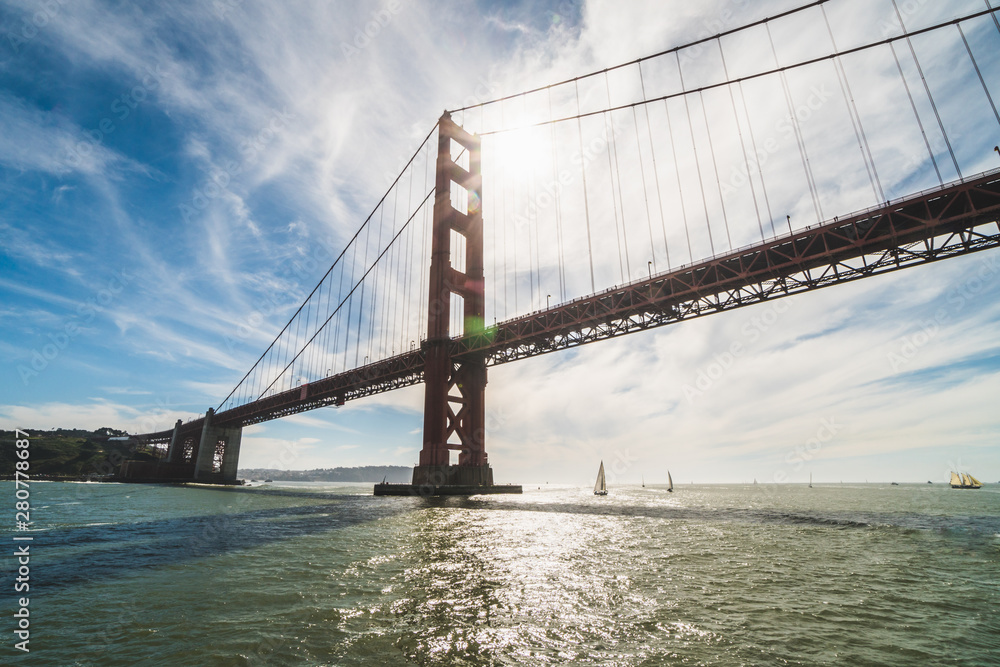 View of the beautiful famous Golden Gate Bridge in San Francisco, California at daylight View of the beautiful famous Golden Gate Bridge in San Francisco, California at daylight