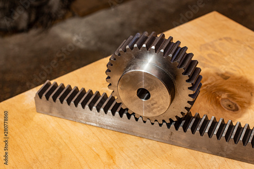 Metal geMetal gear rack with gear for reciprocating motion.ar rack with gear for reciprocating motion.