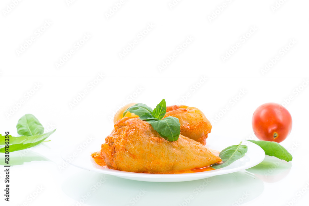 stuffed pepper with meat and vegetable sauce in a plate stuffed pepper with meat and vegetable sauce in a plate