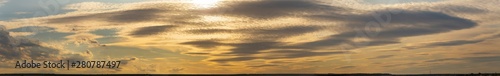 Leaden, storm clouds covered the sunset. Cumuliform cloudscape on blue sky. The terrain in southern Europe. Fantastic skies on the planet earth. Tragic gloomy sky.	