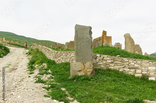 Memorial plate with the names of the fallen during the second world war, the inhabitants of the settlement of Hoi against the medieval necropolis 