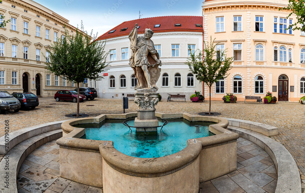 Fountain and Wenceslas Square with the sculpture of Saint Wenceslaus in the old town of Znojmo. Czech Republic.