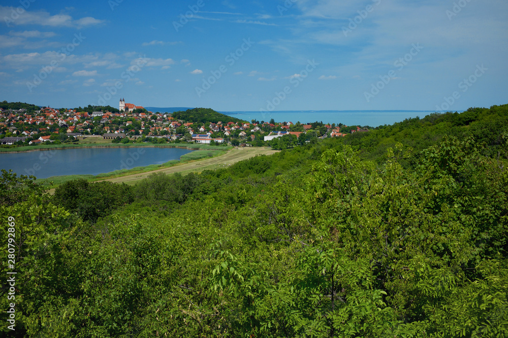 Tihany village and the abbey with the inner lake and forest in the foreground and lake Balaton in Hungary.