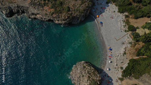 Aerial drone top view photo of iconic pebble beach of Foneas in the heart of Messinian Mani, Peloponnese, Greece