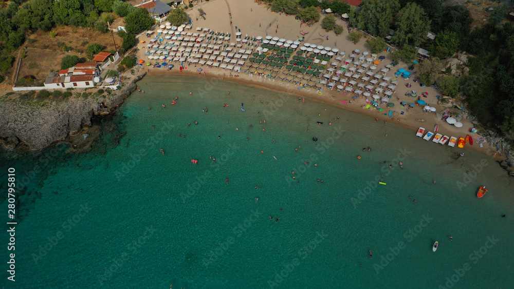 Aerial drone photo of famous organised sandy paradise beach of Kalogria in the heart of Messinian Mani next to iconic village of Stoupa, Peloponnese, Greece