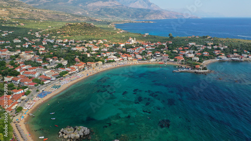 Aerial drone panoramic photo of iconic picturesque village and sandy beach of Stoupa in the heart of Messinian Mani, Peloponnese, Greece © aerial-drone