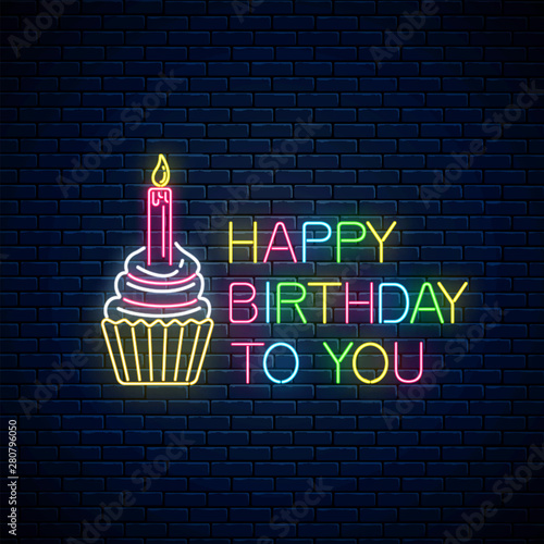 Glowing neon sign of happy birthday card with cake and candle. Birthday cake celebration symbol in neon style.