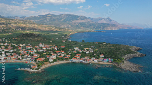 Aerial drone panoramic photo of iconic picturesque village and sandy beach of Stoupa in the heart of Messinian Mani, Peloponnese, Greece