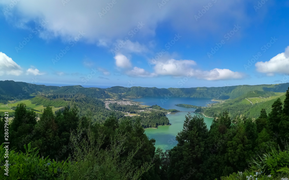 Lagoa das Sete Cidades is located on the island of São Miguel, Azores and is characterized by the double coloration of its waters, in green and blue.