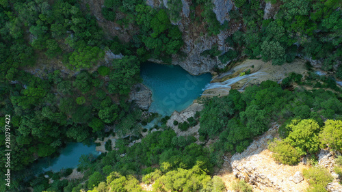 Aerial drone photo of famous mountain lake and waterfall in Polilimnio area in Messinia  Peloponnese  Greece