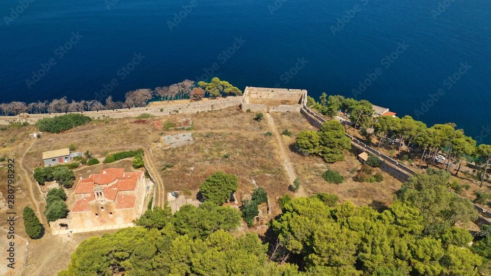 Fototapeta premium Aerial drone photo of iconic medieval castle and village of Pylos or Pilos in the heart of Messinia prefecture, Peloponnese, Greece