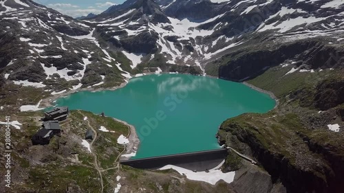 Flight over Weissee Glacier lake in Uttendorf, Salzburger Land, Austria. photo