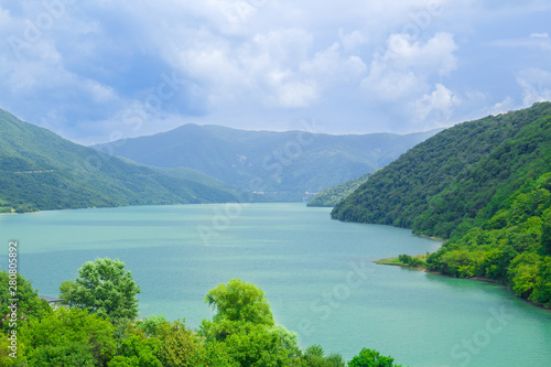 Landscape. Nature. Lake. The mountains. Green Forest. Summer. Blue sky. Clouds Beautiful top view