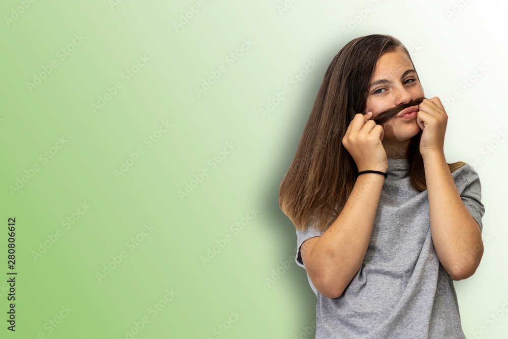 young girl pretending to have mustache using her long hair movember pose young girl pretending to have mustache using her long hair movember pose