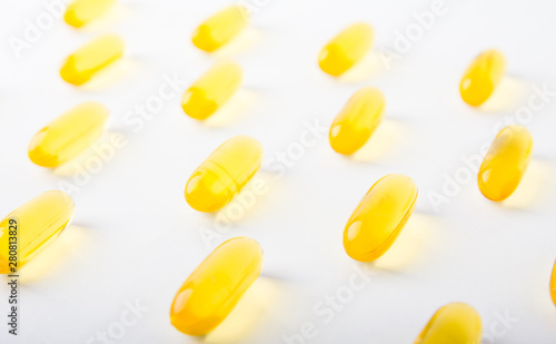 Vitamin, essential oils, dietary supplement yellow pills