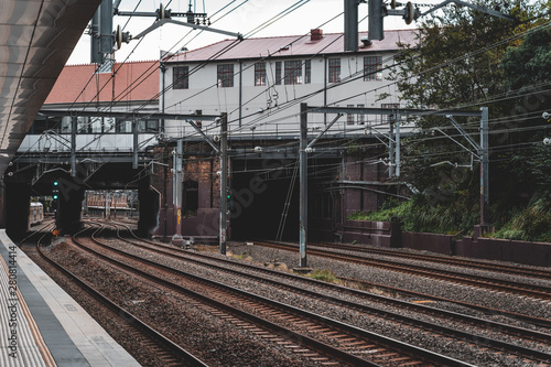 Newtown, New South Wales - JUNE 23rd, 2019: Waiting for the train on a cloudy day at Newtown Station.