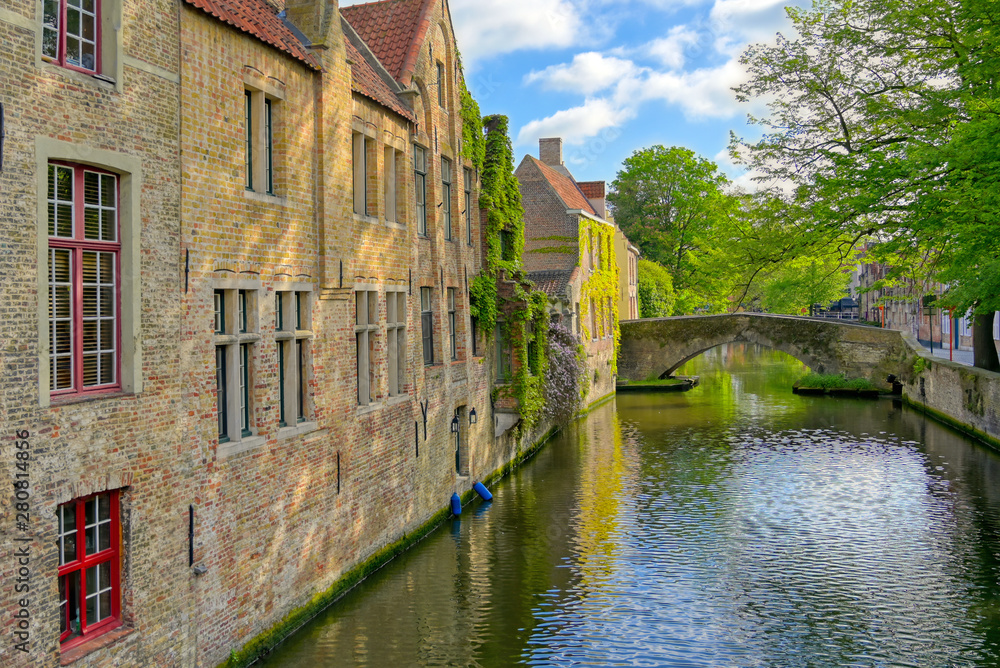 Naklejka premium The canals of Bruges (Brugge), Belgium on a sunny day.