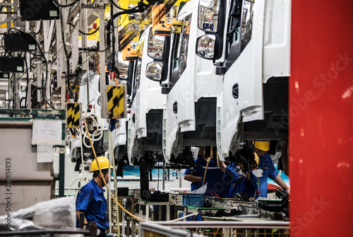 Workers in machinery factory in China.