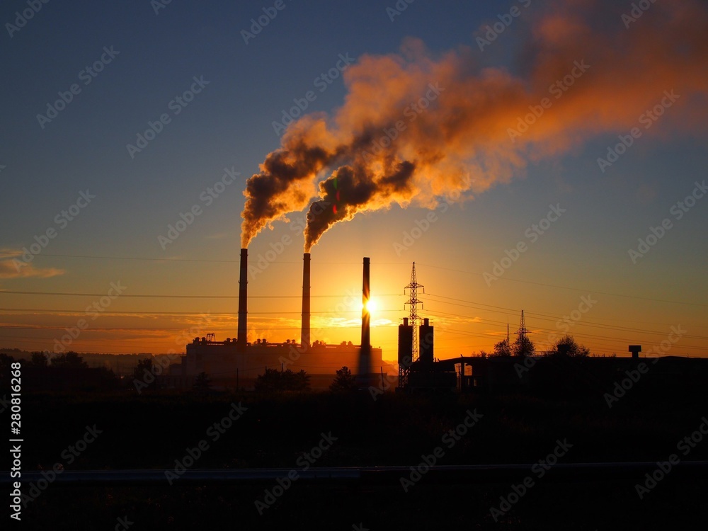 power plant at sunset