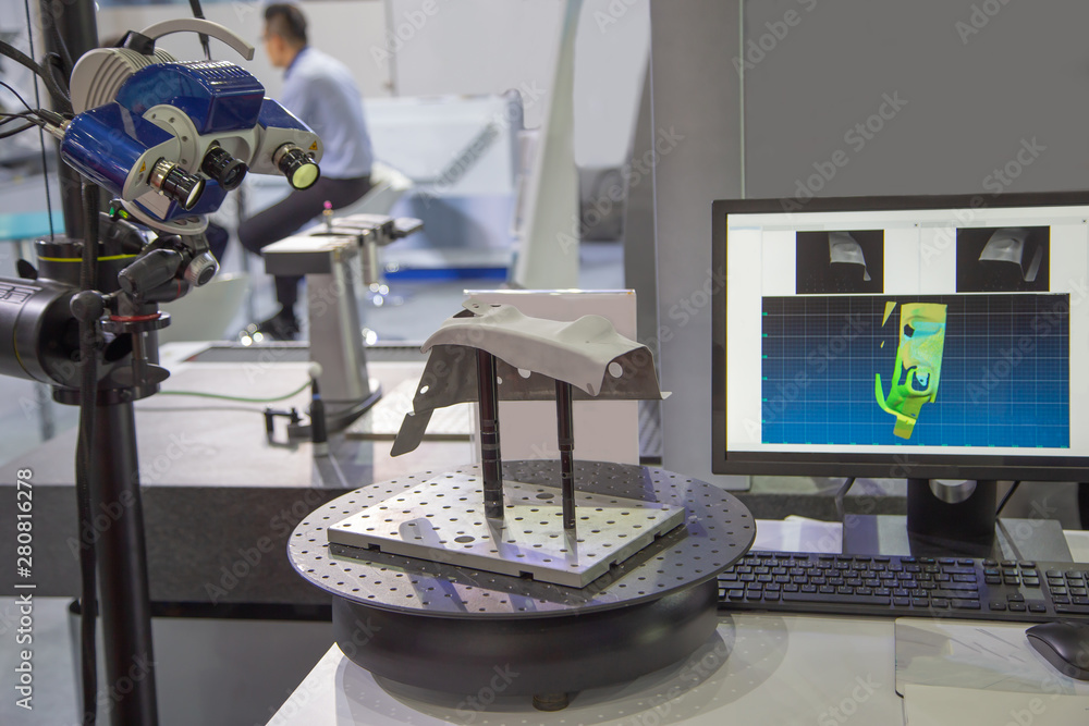 Optical 3D coordinate measuring machine scanning workpiece. Industrial ...