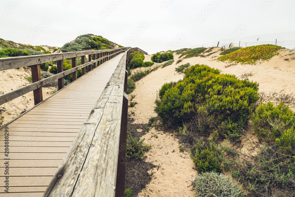 Rustic Wood Beach Boardwalk Through Sand Dunes. Oso Flaco Lake Natural Area State Park, California