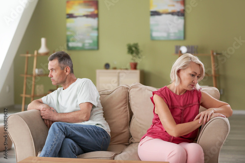 Sad middle-aged couple after quarrel at home © Pixel-Shot