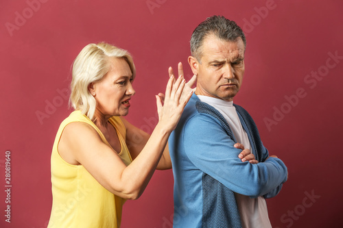 Quarrelling middle-aged cou...