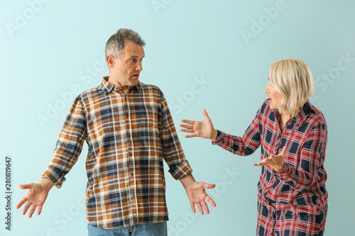 Quarrelling middle-aged cou...
