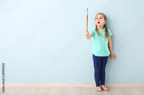 Surprised little girl with ...