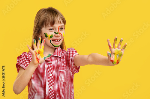 Funny little girl with hand...