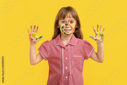 Funny little girl with hand...