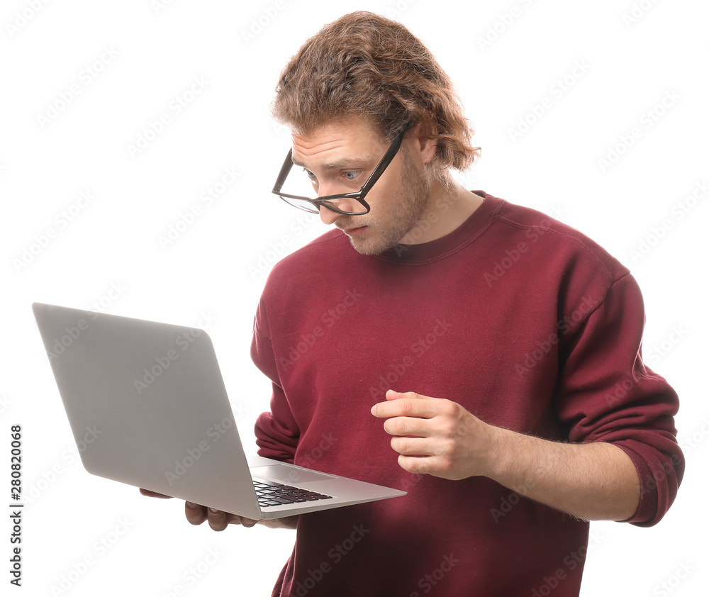 Male programmer with laptop on white background