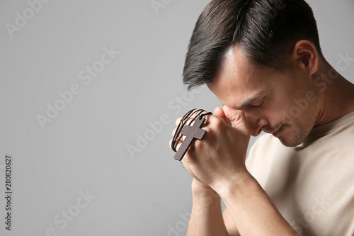 Religious man praying to Go...