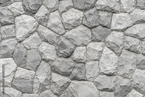 Gray / White rough rock or marble of luxury architecture wall. Background, pattern and texture photo source.