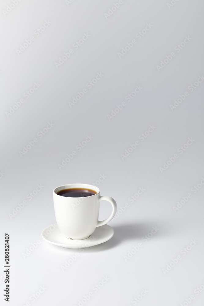 cup of coffee on bright gray background cup of coffee on bright gray background