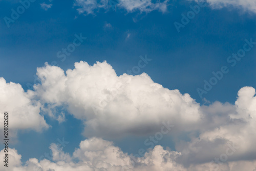 Blue sky background with clouds.