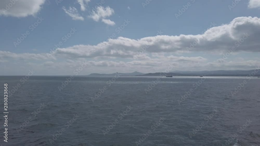 Irish Sea aerial view from Wales with boats and bright sunshine near Holyhead Irish Sea aerial view from Wales with boats and bright sunshine near Holyhead