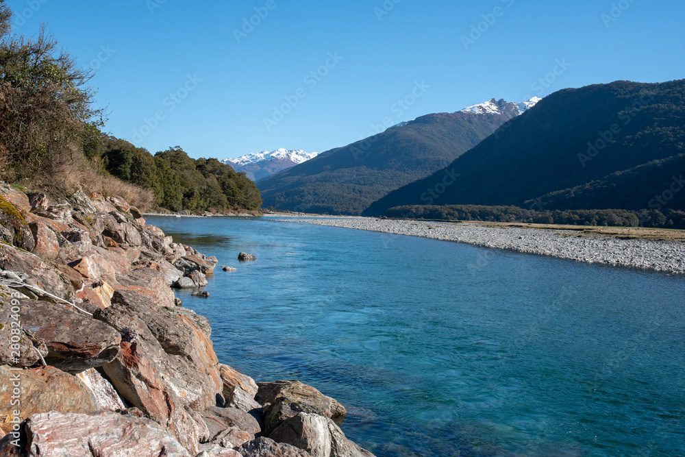 clean pritine blue river water flowing through the Southern Alps