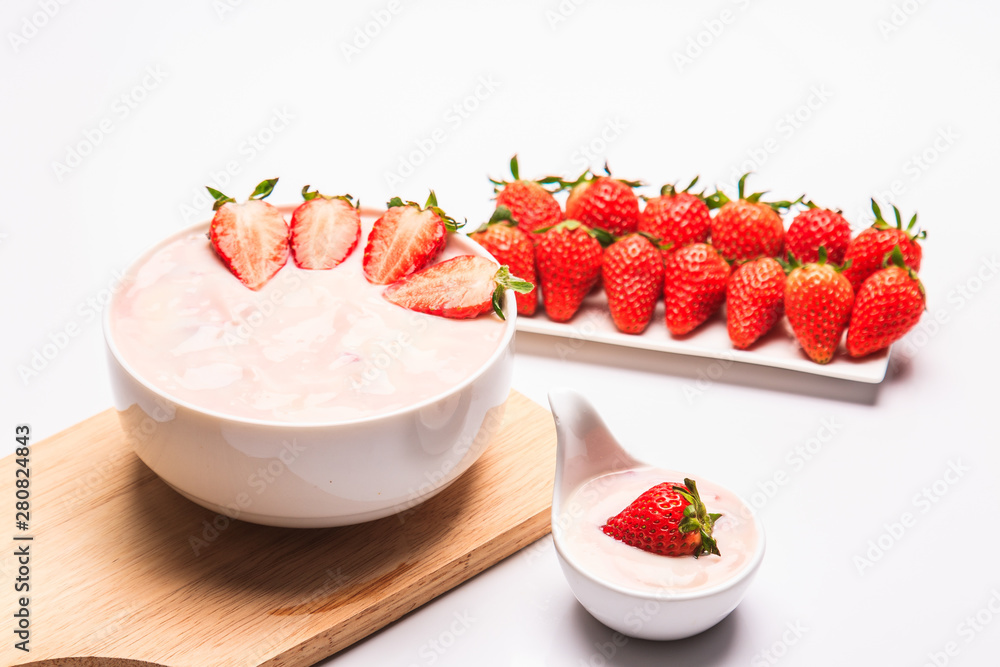 Yogurt with strawberry isolated on white background Yogurt with strawberry isolated on white background