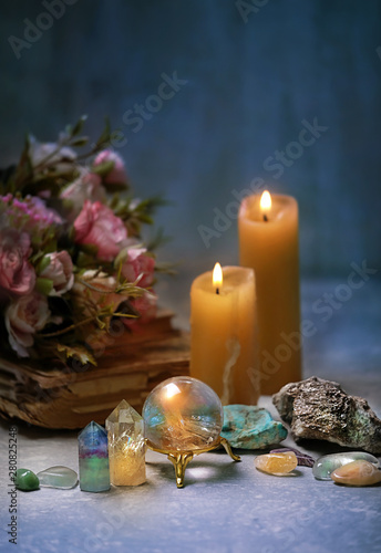 crystal minerals and candles for relaxation  meditation. Rock crystal  fluorite  citrine. Crystal Ritual  Witchcraft  Crystal Layout for Relaxing Chakra  Healing stones. soft focus 